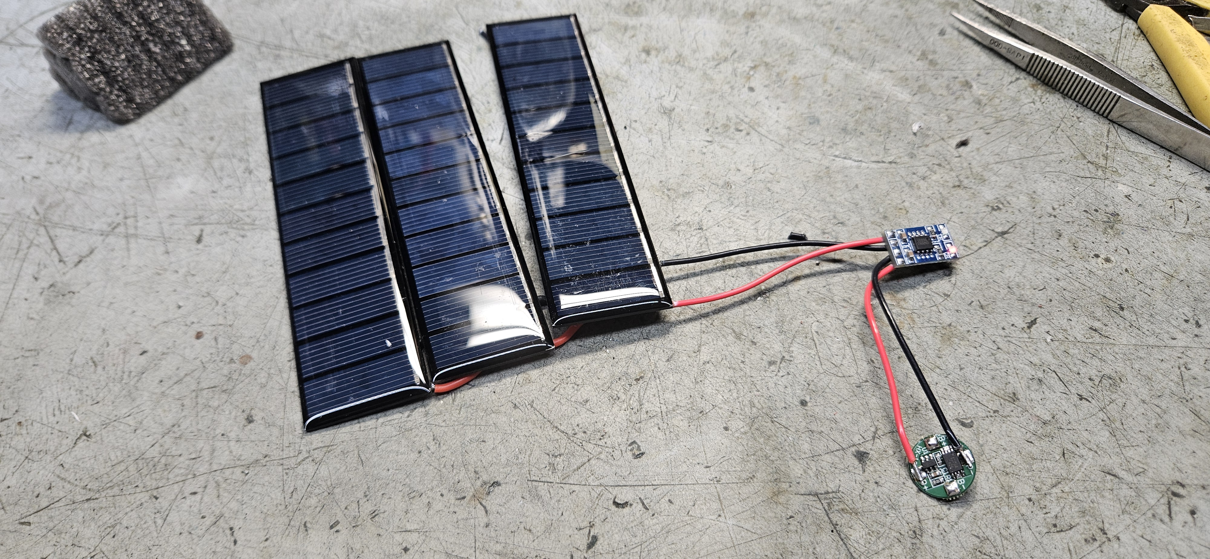 Solar panels, MPPT board, and round BMS board